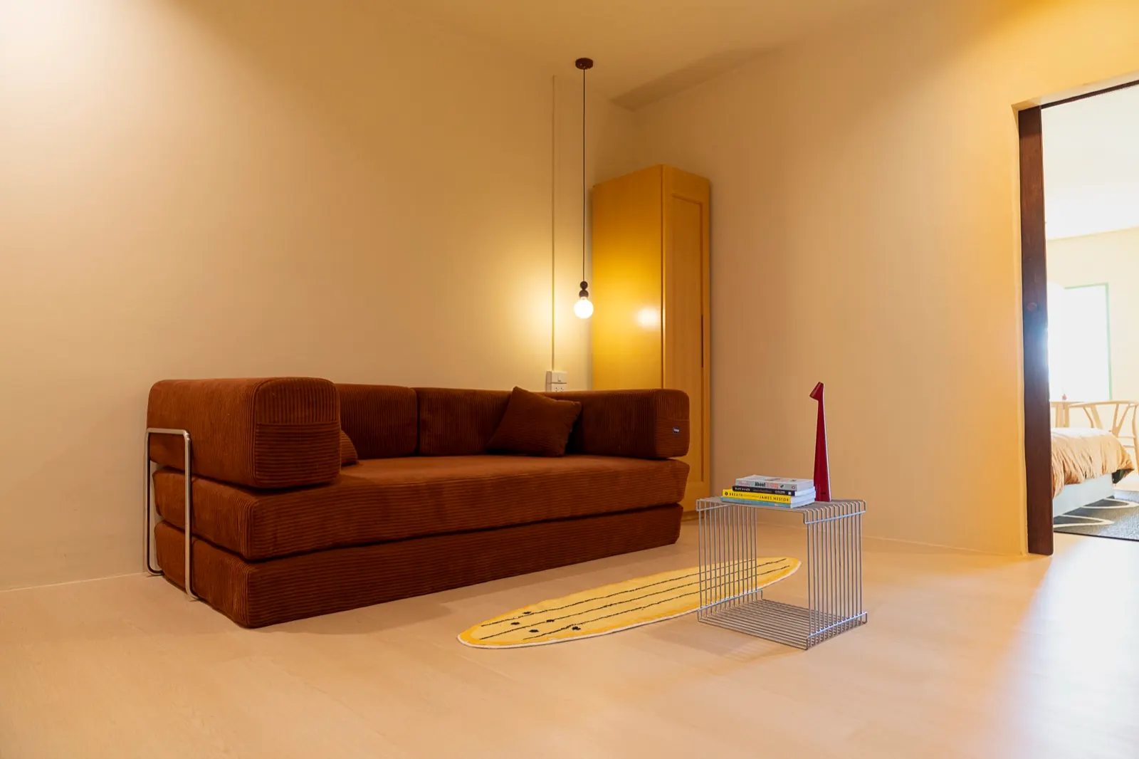 Designer lounge suite with terracotta daybed and surfboard rug for entire sanctuary buyout